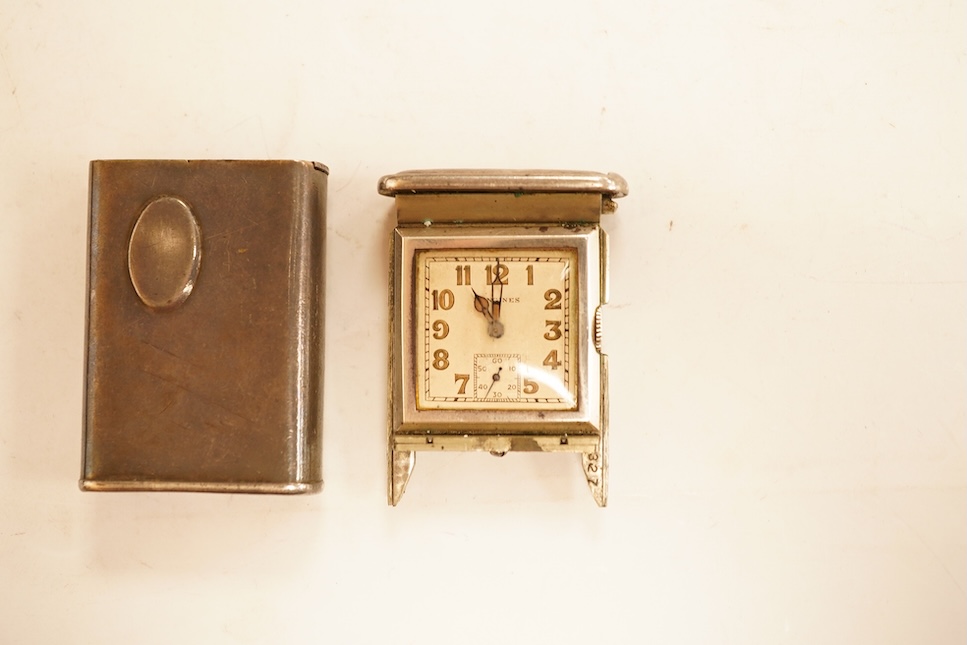 A 1930's/1940's silver plated Longines travelling watch, with Roman dial and subsidiary seconds, a.f. 44mm.